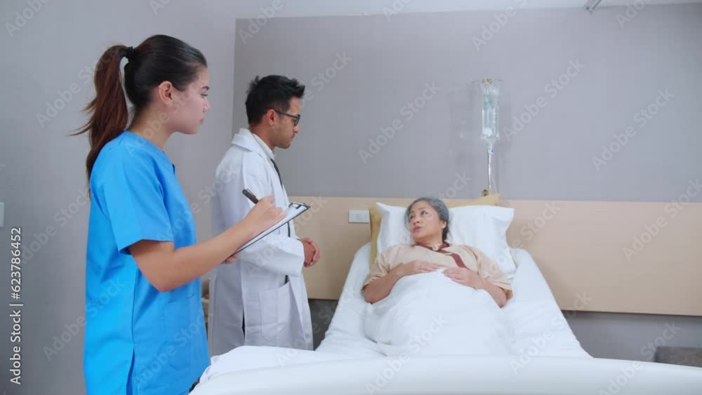 Specialist doctor man and nurse explaining and check with elderly patient in hospital, medical and sick, diagnostic with report medical and healthcare, examining disease and ill, senior and unwell. Specialist doctor man and nurse explaining and check with elderly patient in hospital, medical and sick, diagnostic with report medical and healthcare, examining disease and ill, senior and unwell.