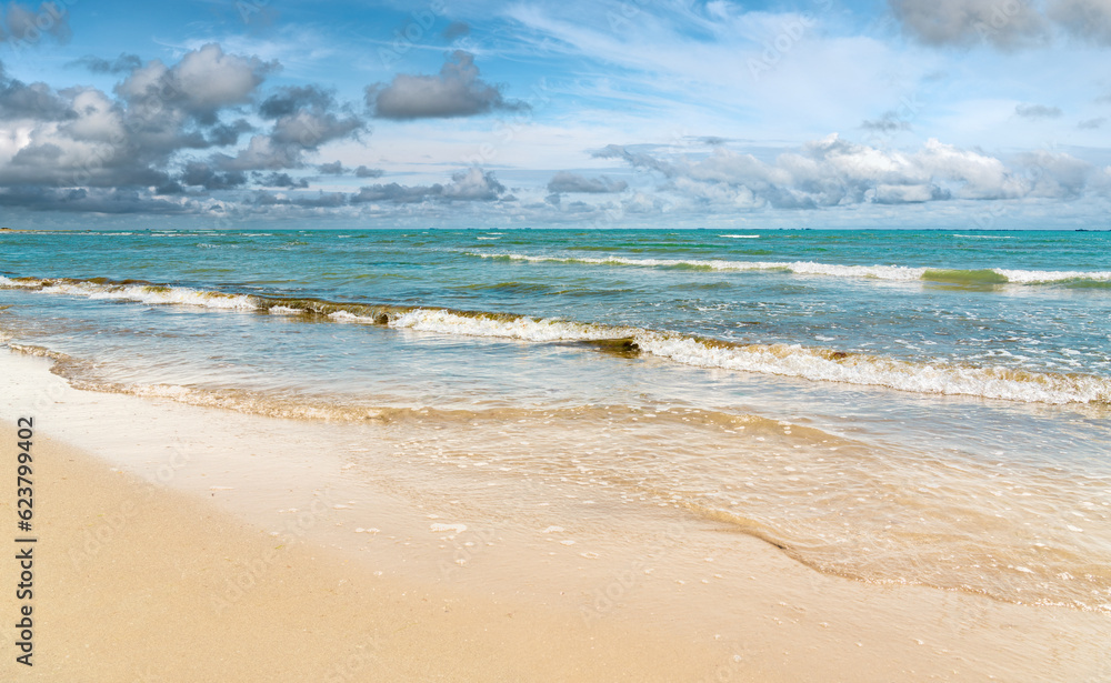 Sea beach with waves and golden sand Sea beach with waves and golden sand