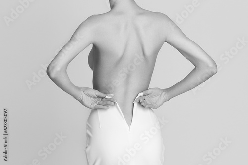 girl in white dress with naked back
