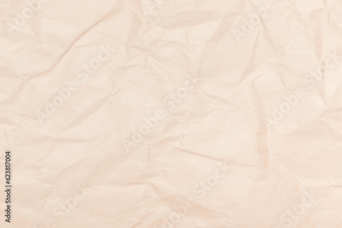 Brown wrinkled wrapping paper. Template for design with copy space