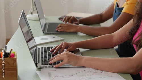 Two women studying at home.