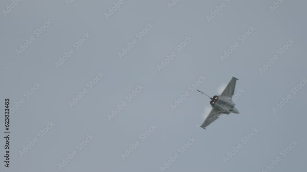 Dassault Rafale fighter jet preforming high speed manoeuvres showing its abilities Dassault Rafale fighter jet preforming high speed manoeuvres showing its abilities
