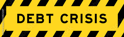 Yellow and black color with line striped label banner with word debt crisis