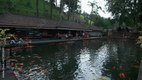 Tirta Empul temple is Hindu Balinese water temple in Bali Indonesia consists of a petirtaan or bathing structure, famous for its holy spring water photo
