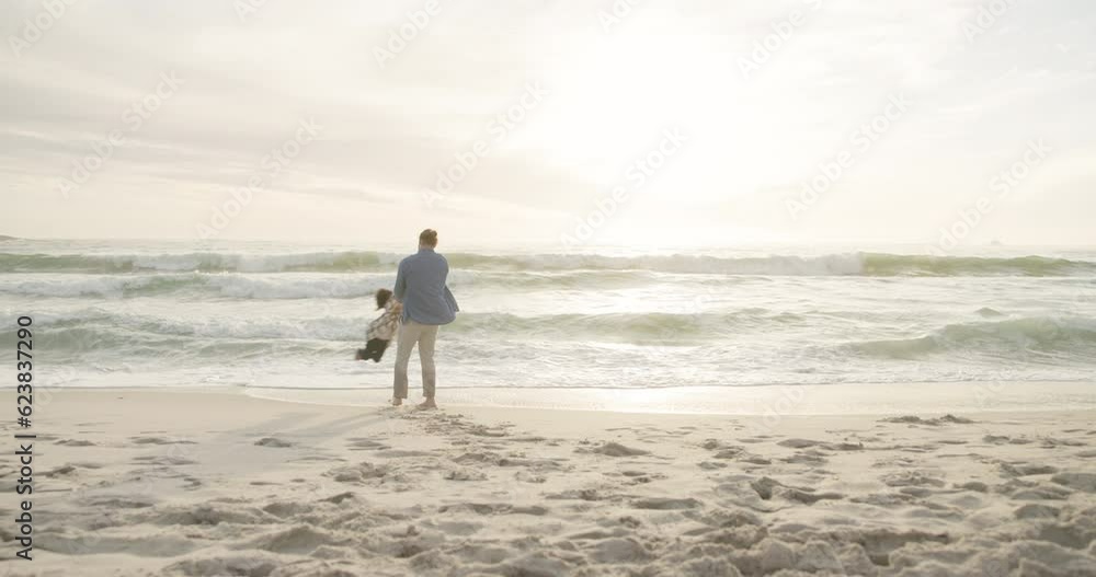 Family, father and swing child on a beach for holiday or vacation for bonding, play and fun. Man and girl kid at sunset for quality time, spin or fly at ocean for travel adventure and wellness Family, father and swing child on a beach for holiday or vacation for bonding, play and fun. Man and girl kid at sunset for quality time, spin or fly at ocean for travel adventure and wellness