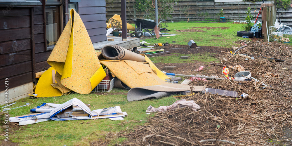 Carpet removed from water damaged house. Cleaning up after flooding. Auckland.