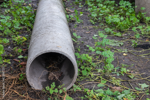 old asbestos pipe on the ground close up