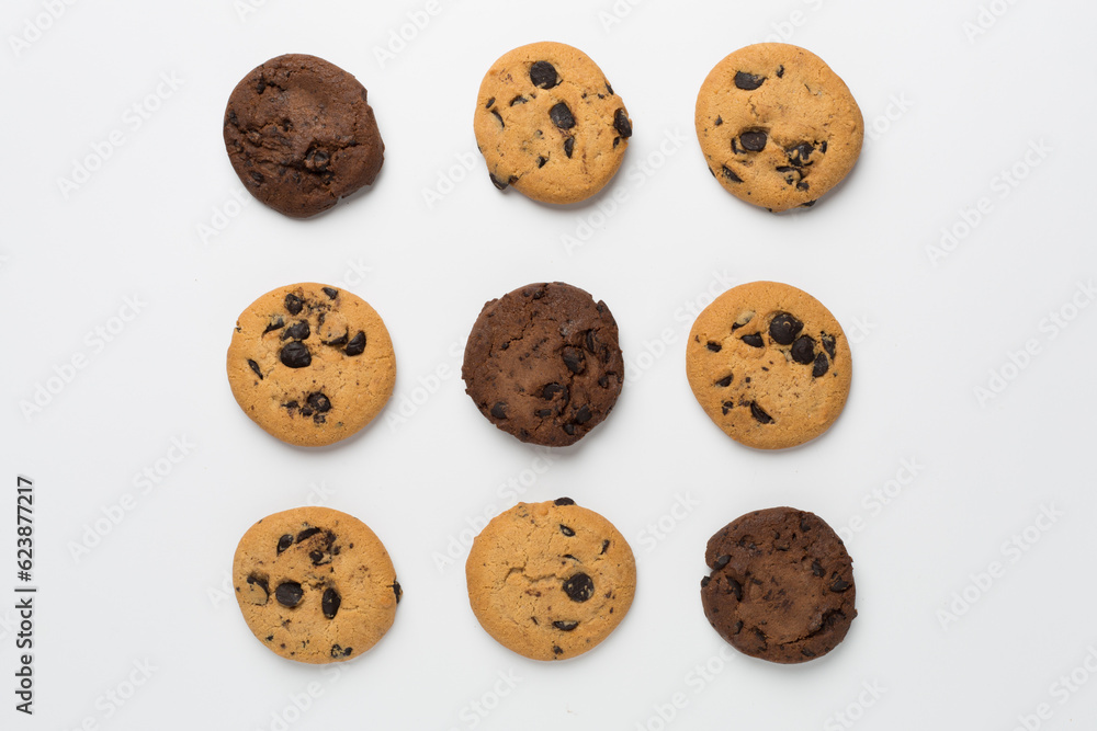 Flat lay with chocolate chip cookies on white background