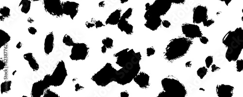 Black random spots vector seamless pattern. Brush irregular black smears  seamless horizontal banner. Spotted cow or dalmatian skin ornament. Irregular abstract texture with hand drawn spots