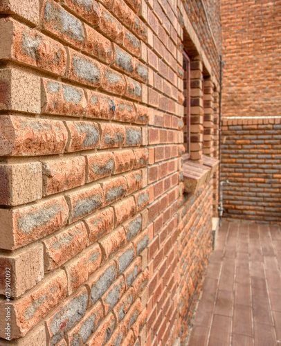 typical architectural style of red brick work for facades