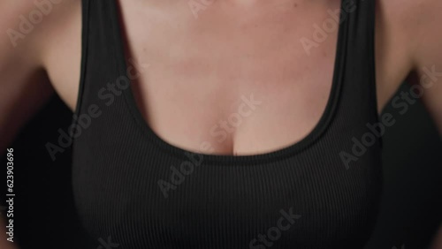 Big female breasts in a bra sexy shaking