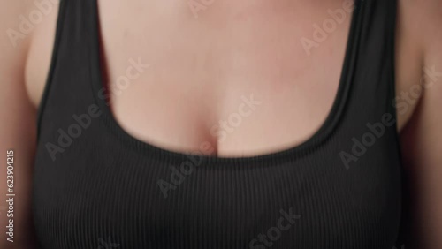 Big female breasts in a bra sexy shaking