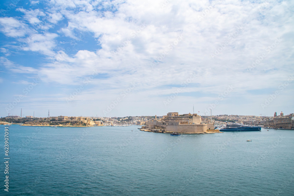 View at the Grand Harbour and the Malta Three Cities (Birgu, Senglea, and Cospicua) from Valletta, Malta. Mediterranean sea.