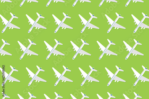 Creative composition made with passenger plane on pastel blue background. Summer travel or vacation pattern.