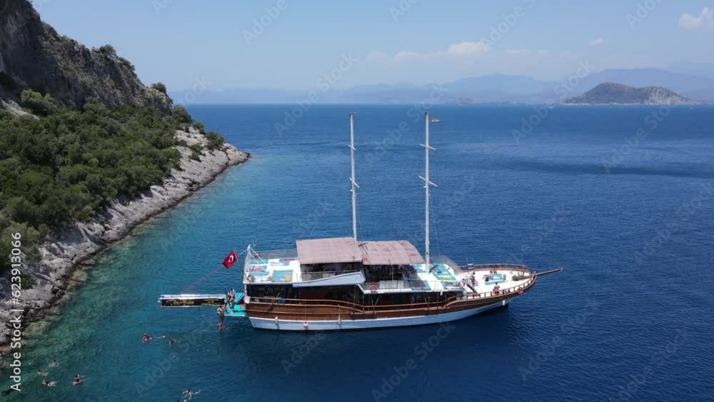 Beautiful view of the beach with boats, pure nature, sea and ships. Shot from a drone. Beautiful view of the beach with boats, pure nature, sea and ships. Shot from a drone.