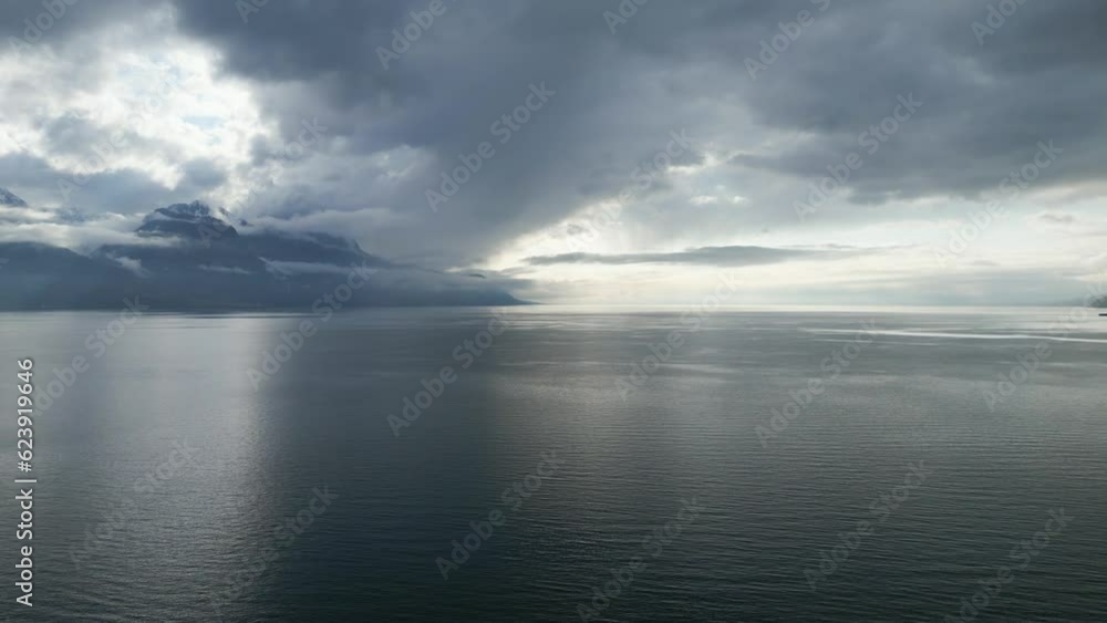 Dramatic sky over Lake Leman in Switzerland - aerial view by drone Dramatic sky over Lake Leman in Switzerland - aerial view by drone