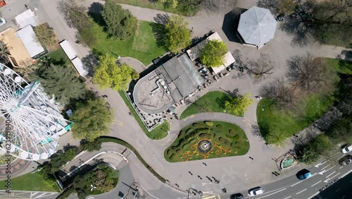 The Enlish Garden with Ferris Wheel and Flower Clock in Geneva from above - aerial view by drone photo