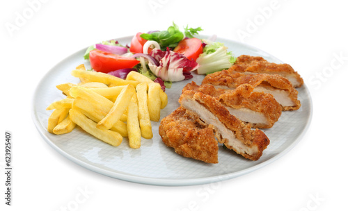 Plate of delicious cut schnitzel with french fries and vegetable salad isolated on white