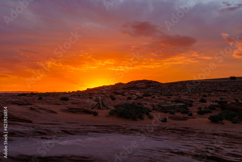 Orange sunrise with clouds in the desert near Page, Arizona during spring 