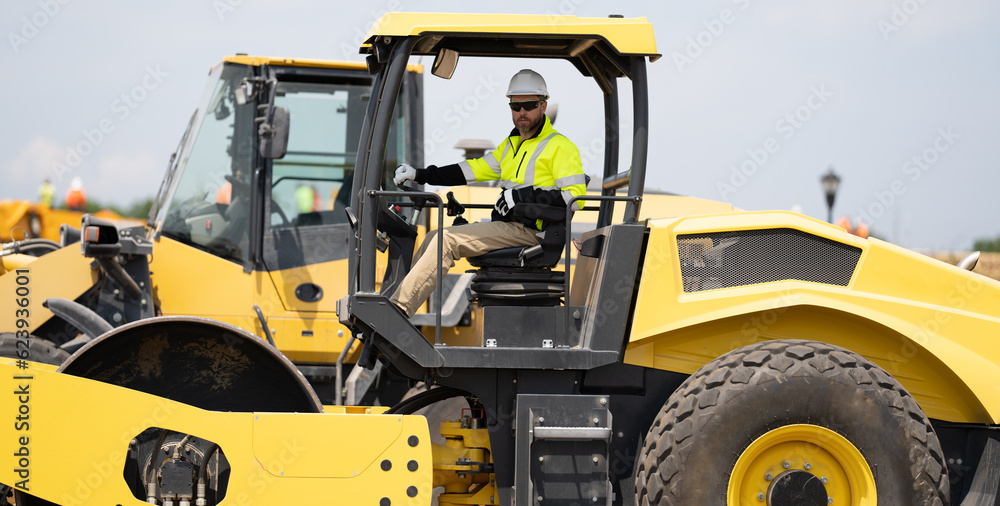 construction worker man drive heavy machinery for road. hispanic man worker at construction machinery outdoor. construction worker man used vibratory roller. busy worker man on construction equipment construction worker man drive heavy machinery for road. hispanic man worker at construction machinery outdoor. construction worker man used vibratory roller. busy worker man on construction equipment