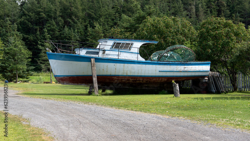 A little fishing boat in a dry dock photo