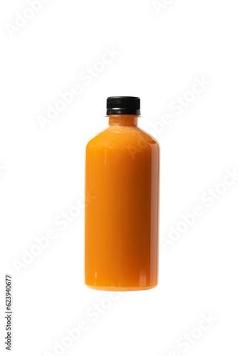 orange colour oganic cold pressed juice in bottle on white background
