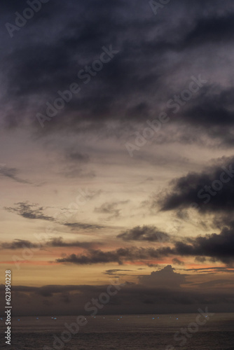 Tropical sunset in Bali island overlooking the ocean