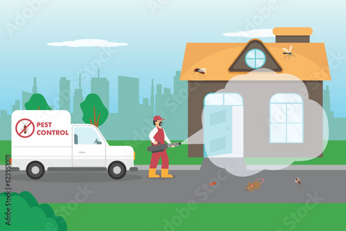 Pest control worker spraying insecticide at house