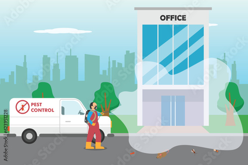 Pest control worker spraying insecticide at office