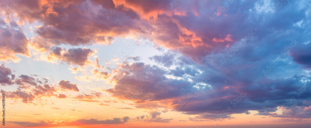 Majestic real sunrise sundown sky background with gentle colorful clouds