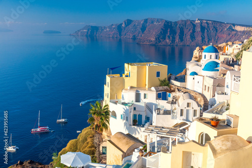 view of Santorini, Greece. White architecture, yachts and the blue sea of the island of Santorini against the background of the sea.