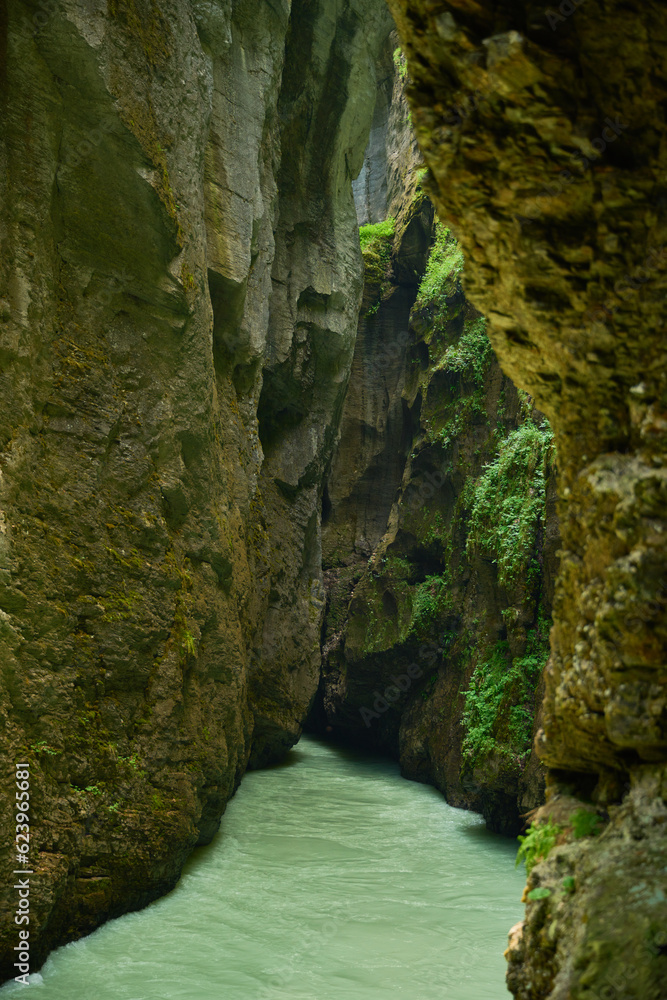River running in a canyon in Aareschlucht in Switzerland River running in a canyon in Aareschlucht in Switzerland