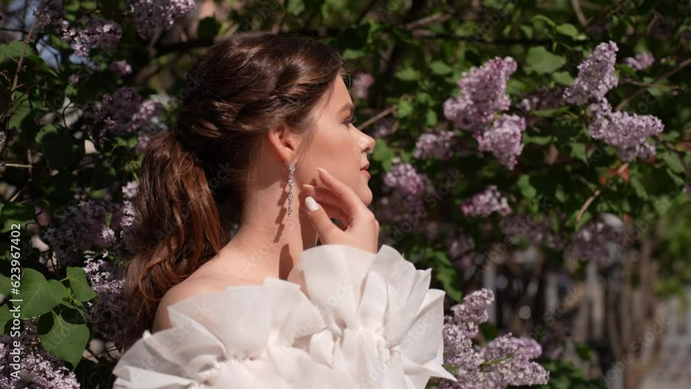 Bride on a background of lilacs Bride on a background of lilacs