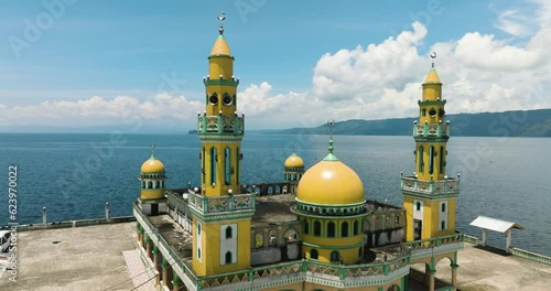Beautiful Linuk Masjid with Lake Lanao on background. Lanao del Sur. Mindanao, Philippines. photo