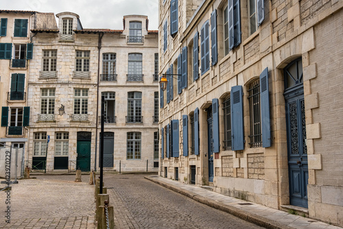 Narrow street with doors and windows typical of the French Basque country, Bayonne