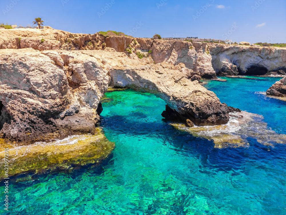 Love Bridge near Nissi beach, Ayia Napa, Cyprus. Rocks and azure water