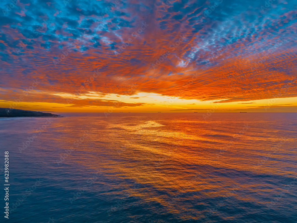 Sunrise at the seaside with beautiful cloudcover