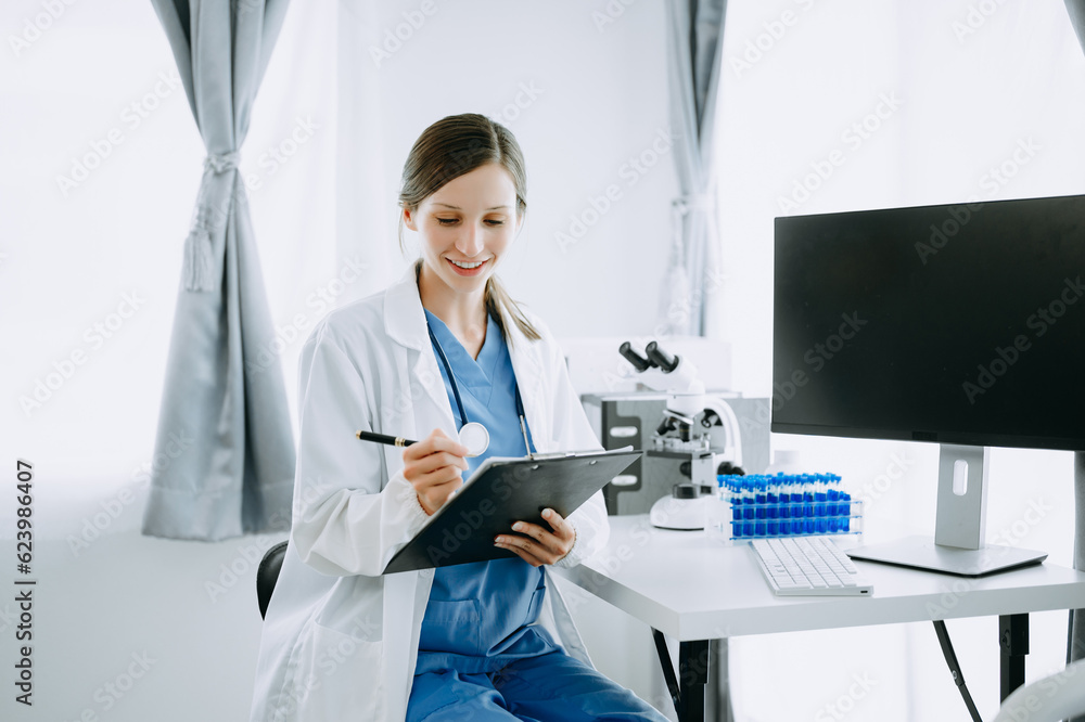 Caucasian smiling doctor or consultant sitting at a desk his neck biochemical samples, science chemical laboratory Caucasian smiling doctor or consultant sitting at a desk his neck biochemical samples, science chemical laboratory