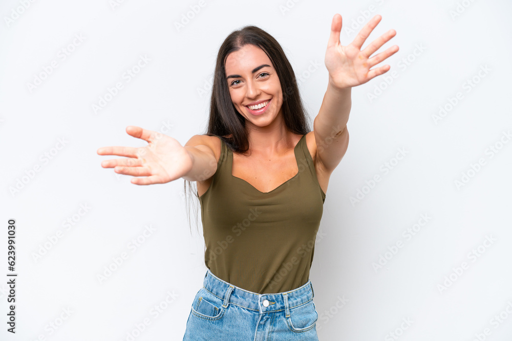 Young caucasian woman isolated on white background presenting and inviting to come with hand Young caucasian woman isolated on white background presenting and inviting to come with hand
