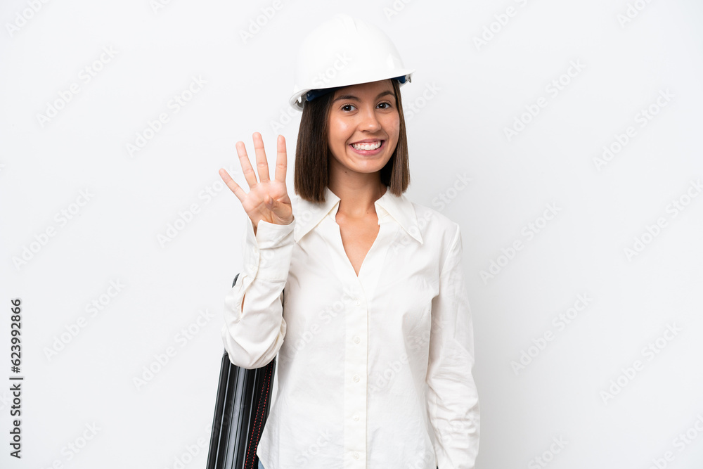 Young architect woman with helmet and holding blueprints isolated on white background happy and counting four with fingers Young architect woman with helmet and holding blueprints isolated on white background happy and counting four with fingers