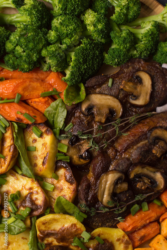 grilled vegetables with meat and mushrooms.