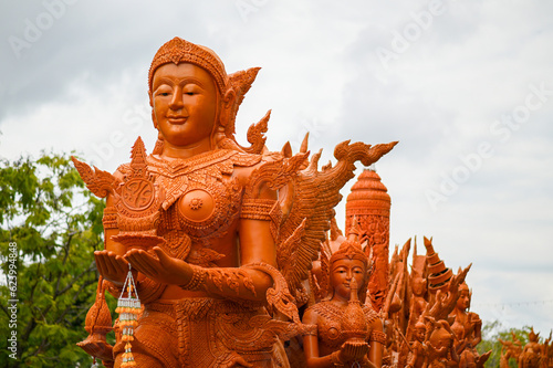 Art of candle decoration to celebrate in candle festival in The End of Buddhist Lent in Ubon Ratchathani, Thailand held on July 14, 2022 photo