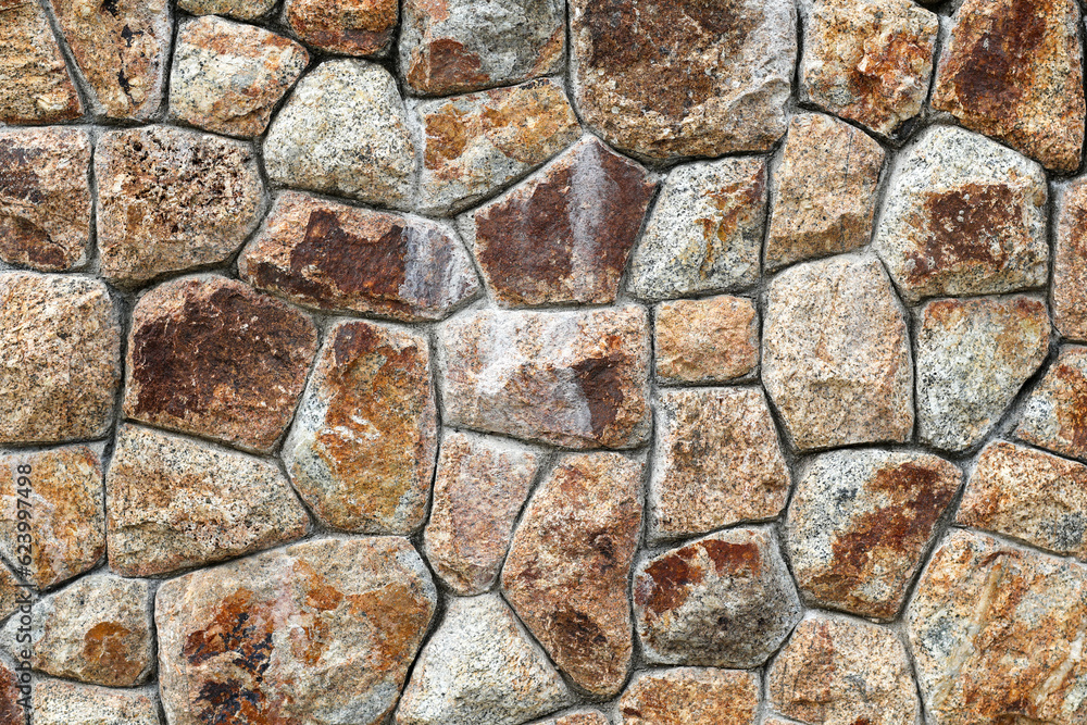 A stone brick wall is a structure constructed by arranging and cementing together individual pieces of stone. Stone bricks are typically cut or shaped to specific dimensions, creating uniform blocks t A stone brick wall is a structure constructed by arranging and cementing together individual pieces of stone. Stone bricks are typically cut or shaped to specific dimensions, creating uniform blocks t