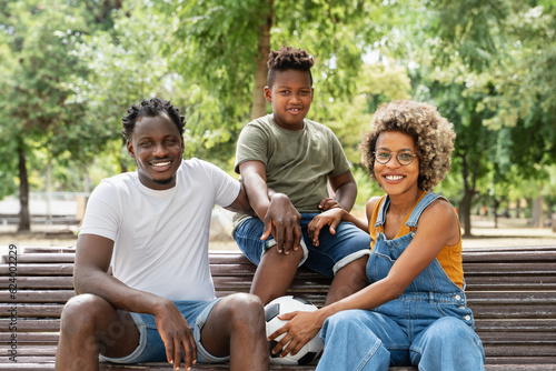 Portrait of African American Family in the Park  © EFStock