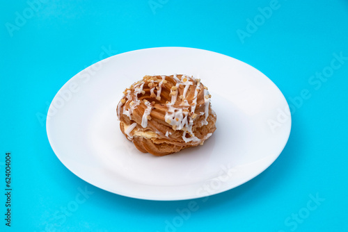 Food, donuts, sweets, custard, on a clean background, blue, banner, peach, pastries, decorative pastries, sweet, tasty, on a plate, on a plate