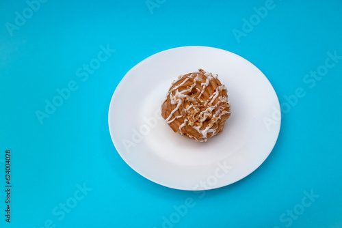 Food, donuts, sweets, custard, on a clean background, blue, banner, peach, pastries, decorative pastries, sweet, tasty, on a plate, on a plate