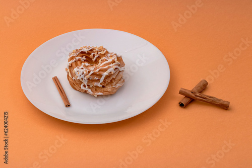 food, donuts, sweets, custard, on a clean background, brown, banner, peach, pastries, decorative pastries, sweet, tasty, on a plate,