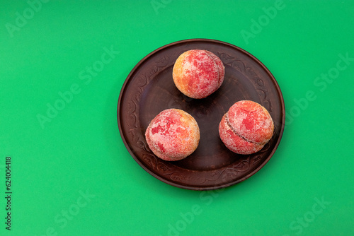 food, donuts, sweets, custard, on a clean background, green, banner, peach, pastries, decorative pastries, sweet, tasty, on a plate,
