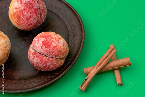 food, donuts, sweets, custard, on a clean background, green, banner, peach, pastries, decorative pastries, sweet, tasty, on a plate,
