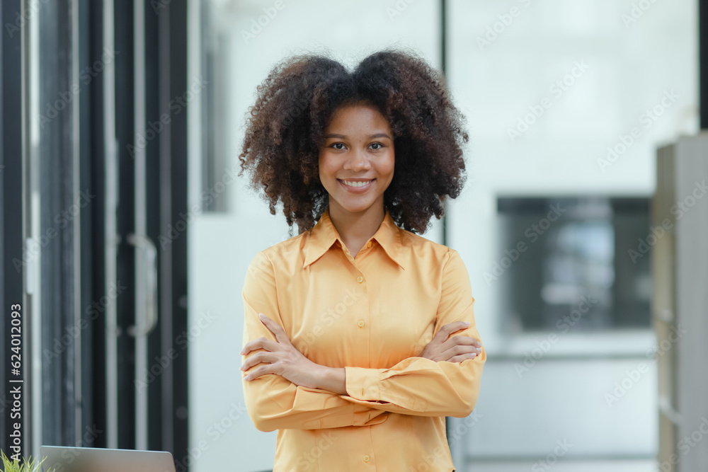 Portrait of candid happy African American businesswoman. Portrait of candid happy African American businesswoman.